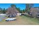 Large backyard with boat, shed, and trampoline at 700 Se 49Th Ave, Ocala, FL 34471