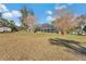 Spacious backyard with a large grassy area at 700 Se 49Th Ave, Ocala, FL 34471