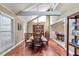 Elegant dining room features hardwood floors and a large hutch at 700 Se 49Th Ave, Ocala, FL 34471