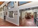 Long hallway with views into living and dining areas at 700 Se 49Th Ave, Ocala, FL 34471