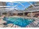 Large, refreshing pool with a screened enclosure at 700 Se 49Th Ave, Ocala, FL 34471