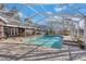 Enjoy this refreshing pool and screened enclosure at 700 Se 49Th Ave, Ocala, FL 34471