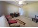 Spacious bedroom with a sitting area, desk, and built in closet at 7375 Sw 106Th St, Ocala, FL 34476