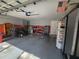 Attached garage with ample storage and workshop space at 7375 Sw 106Th St, Ocala, FL 34476