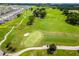 Expansive golf course view with lush green fairways and manicured greens in a beautiful community at 7387 Sw 99Th Ct, Ocala, FL 34481