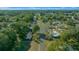 Wide aerial view of a residential neighborhood, showcasing houses and roads at 7556 Sw 112Th Ln, Ocala, FL 34476