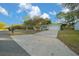 Charming single-story home featuring a wide driveway, two-car garage, and a well-maintained lawn at 7556 Sw 112Th Ln, Ocala, FL 34476