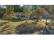 Inviting single-story home with a well-kept lawn and mature trees at 7556 Sw 112Th Ln, Ocala, FL 34476