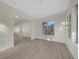 Spacious living room filled with natural light featuring light wood floors at 7556 Sw 112Th Ln, Ocala, FL 34476