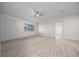 Living room with wood-look flooring and an open floor plan at 7556 Sw 112Th Ln, Ocala, FL 34476