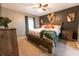 Spacious main bedroom with large bed, ensuite bathroom, and plenty of natural light at 7958 Juniper Rd, Ocala, FL 34480