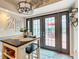 Kitchen dining area with French doors leading to patio at 8476 Sw 108Th Place Rd, Ocala, FL 34481