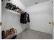 Walk-in closet with ample hanging and shelving space at 8597 Sw 108Th Lane Rd, Ocala, FL 34481