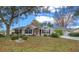 Charming one story home with a well manicured lawn and driveway at 8597 Sw 108Th Lane Rd, Ocala, FL 34481