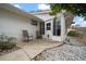 Small patio with seating area, great for outdoor relaxation at 8597 Sw 108Th Lane Rd, Ocala, FL 34481