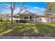 Front view of charming house with porch and landscaping at 8677 Sw 95Th Ln # F, Ocala, FL 34481