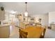 Kitchen dining area with wood table and chairs at 9111 Sw 102Nd Cir, Ocala, FL 34481