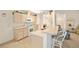 Kitchen features white appliances and wood cabinets at 9111 Sw 102Nd Cir, Ocala, FL 34481