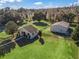 Aerial view of property showing home, barn and fenced pastures at 9270 Sw 9Th Ter, Ocala, FL 34476