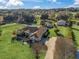 Aerial view of house with large yard and driveway at 9270 Sw 9Th Ter, Ocala, FL 34476