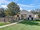 Exterior of a light-colored barn with a walkway at 9270 Sw 9Th Ter, Ocala, FL 34476