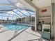 Screened pool with patio and outdoor kitchen at 9270 Sw 9Th Ter, Ocala, FL 34476