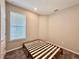 Simple bedroom with window and platform bed at 9326 Sw 52Nd Loop, Ocala, FL 34481