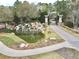 Stone Creek community entrance with a pond and waterfall feature at 9326 Sw 52Nd Loop, Ocala, FL 34481