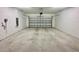 Clean and empty double-car garage at 9326 Sw 52Nd Loop, Ocala, FL 34481