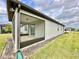 Screened porch with sliding glass doors and a view of the yard at 9326 Sw 52Nd Loop, Ocala, FL 34481