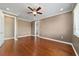 Spacious bedroom with hardwood floors and ceiling fan at 9840 Sw 90Th St, Ocala, FL 34481