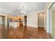 Bright dining room with hardwood floors and a chandelier at 9840 Sw 90Th St, Ocala, FL 34481