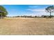 View of a golf course with homes in the background at 9840 Sw 90Th St, Ocala, FL 34481