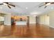 Spacious living room featuring hardwood floors and an open concept design at 9840 Sw 90Th St, Ocala, FL 34481