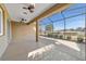 Enjoy the view from this screened patio, complete with ceiling fans at 9840 Sw 90Th St, Ocala, FL 34481