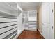 Spacious walk-in closet with built in shelves at 9840 Sw 90Th St, Ocala, FL 34481