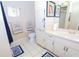 Clean bathroom with shower/tub combo, vanity, and toilet at 10602 Se 179Th Ln, Summerfield, FL 34491