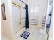 Bathroom with tub shower, toilet and vanity at 10602 Se 179Th Ln, Summerfield, FL 34491