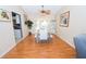 Bright dining room with a wooden table and chairs, and sliding glass doors at 10602 Se 179Th Ln, Summerfield, FL 34491
