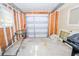 Unfinished garage with large door and space for storage at 10602 Se 179Th Ln, Summerfield, FL 34491