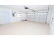 Clean and spacious garage with automatic door opener at 10602 Se 179Th Ln, Summerfield, FL 34491