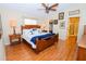 Large main bedroom with wood floors and walk-in closet at 10602 Se 179Th Ln, Summerfield, FL 34491