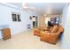 Spacious sunroom with comfortable seating and plenty of natural light at 10602 Se 179Th Ln, Summerfield, FL 34491