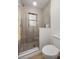 Tiled stand-up shower with glass door and updated plumbing fixtures at 11 Bahia Court Loop, Ocala, FL 34472