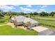 Single-story home on large lot with circular driveway at 12000 S Highway 475, Ocala, FL 34480