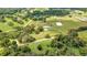 Aerial view showcasing a large estate property with ample land and a home at 12000 S Highway 475, Ocala, FL 34480