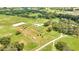 Aerial view of a home with pool and surrounding land at 12000 S Highway 475, Ocala, FL 34480