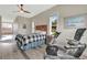 Serene bedroom with exercise bike, hardwood floors, and access to bathroom at 12000 S Highway 475, Ocala, FL 34480