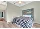 Bright bedroom with wood floors and ceiling fan at 12000 S Highway 475, Ocala, FL 34480