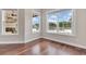 Bright breakfast nook with large windows overlooking the pool at 12000 S Highway 475, Ocala, FL 34480